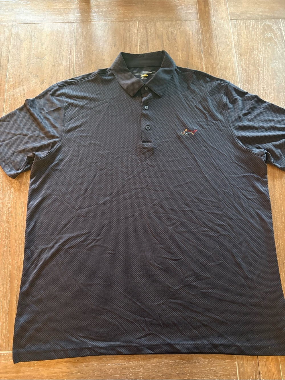 Greg Norman Collection Men's Navy Performance Polo with Subtle Texture